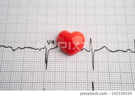 Electrocardiogram ECG heart wave, heart attack, cardiogram report. Electrocardiogram ECG heart wave, heart attack, cardiogram report. 142539334
