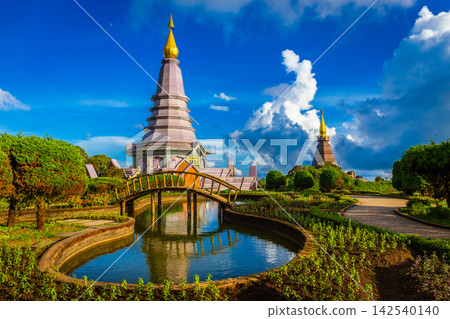Beautiful landscape aerial view of Doi Inthanon in evening time with blue sky background buddhist stupa landmark tourism at Chiang Mai of north Thailand. 142540140