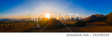 Panorama Landscape of Temple on the mountain at Simalai Songtham Temple in Khao Yai, Pak Chong, Nakhon Ratchasima, Thailand in sunset time Panorama Landscape of Temple on the mountain at Simalai Songtham Temple in Khao Yai, Pak Chong, Nakhon Ratchasima, Thailand in sunset time 142540195