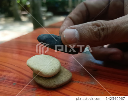 Dark stone hand wooden table 142540967