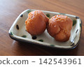 Sata andagi served in Okinawan Yachimun pottery 142543961