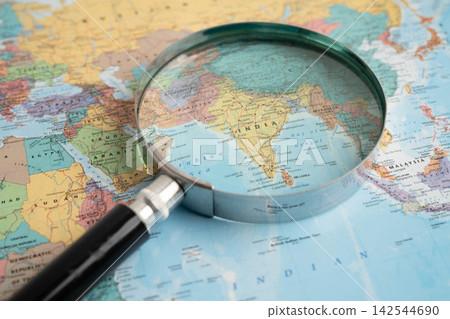 Bangkok, Thailand December 10, 2023 India map in world map paper. Bangkok, Thailand December 10, 2023 India map in world map paper. 142544690