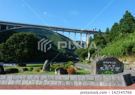 Blue sky, Lake Ikeda waterfront park, and Lake Ikeda Bridge Blue sky, Lake Ikeda waterfront park, and Lake Ikeda Bridge 142545766