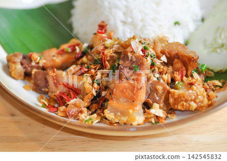 stir fried pork or deep fried pork , fried pork or crispy pork and rice or belly of pork stir fried pork or deep fried pork , fried pork or crispy pork and rice or belly of pork 142545832