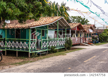 Colorful natural-framed houses wit Colorful natural-framed houses wit 142547758