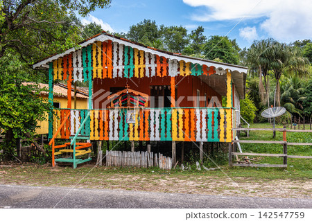Colorful natural-framed houses wit Colorful natural-framed houses wit 142547759