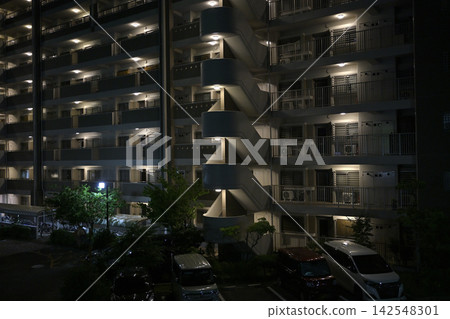 Apartment house at night 142548301
