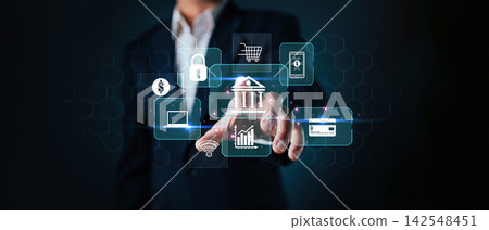 Businessman touching virtual interface of digital banking and financial payment. Fintech technology network concept for global economy and online business investment connection. Businessman touching virtual interface of digital banking and financial payment. Fintech technology network concept for global economy and online business investment connection. 142548451