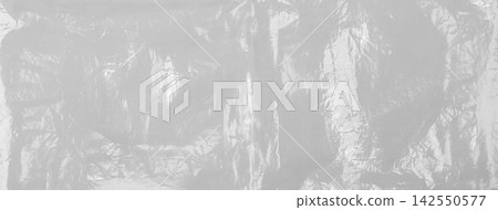 Crinkled transparent film showing abstract texture background Crinkled transparent film showing abstract texture background 142550577