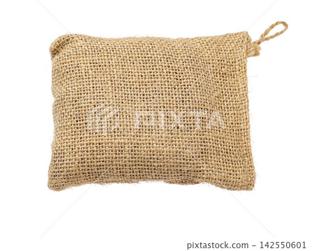 Burlap sack filled with natural textured fabric material Burlap sack filled with natural textured fabric material 142550601