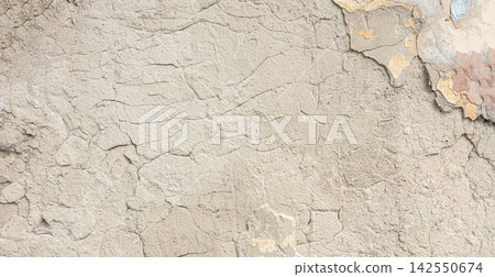 Cracked weathered wall texture showing peeling paint background Cracked weathered wall texture showing peeling paint background 142550674