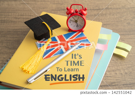 Time to learn English language, book with uk flag. Time to learn English language, book with uk flag. 142551042