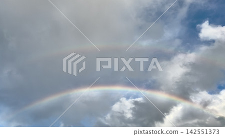 A double rainbow in the sky A double rainbow in the sky 142551373