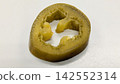 Pickled jalapeños, sliced green chilies, Mexican cuisine ingredients, white background. 142552314