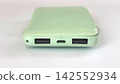 Protect the swollen terminals of the mobile battery with tape. 142552934