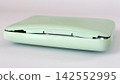 A mobile battery that has expanded and opened up - white background 142552995
