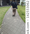Seniors taking a walk in the park 142553062