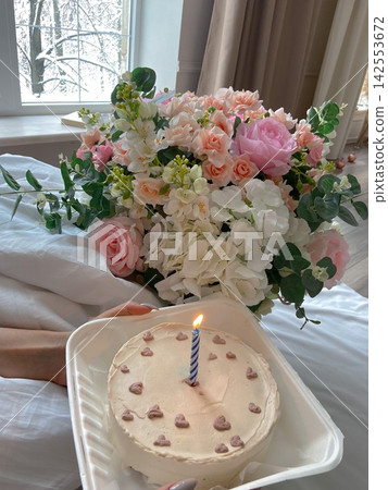 Minimal Birthday Cake in Takeaway Box on White Bed Minimal Birthday Cake in Takeaway Box on White Bed 142553672