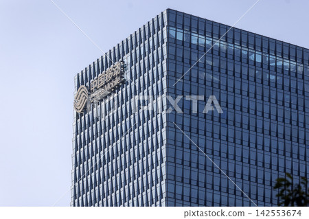 exterior of office by China Mobile, a Chinese state-owned telecommunications company exterior of office by China Mobile, a Chinese state-owned telecommunications company 142553674