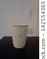 Coffee cup in a cup 142554365