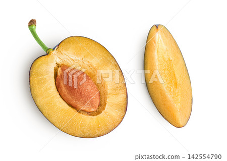 fresh blue plum half isolated on white background. Top view. Flat lay fresh blue plum half isolated on white background. Top view. Flat lay 142554790