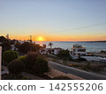 Golden hour ocean sunset view from a beach resort villa 142555206