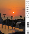 Golden hour ocean sunset view from a beach resort villa 142555207