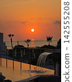 Golden hour ocean sunset view from a beach resort villa 142555208