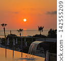 Golden hour ocean sunset view from a beach resort villa 142555209