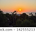 Golden hour ocean sunset view from a beach resort villa 142555213