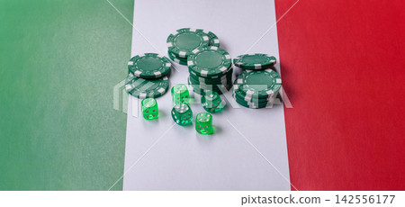 Playing cards, dice and chips on a table, a gambling game of blackjack. Cards, dice and chips Playing cards, dice and chips on a table, a gambling game of blackjack. Cards, dice and chips 142556177