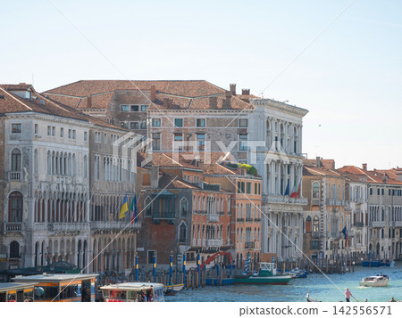 Landscape with Rialto Bridge and gondola Grand Canal in Venice, Italy, Europe. Landscape with Rialto Bridge and gondola Grand Canal in Venice, Italy, Europe. 142556571