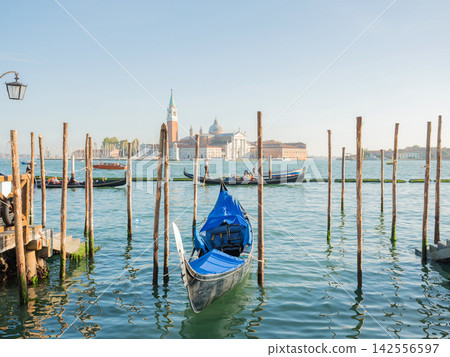 Landscape with Rialto Bridge and gondola Grand Canal in Venice, Italy, Europe. Landscape with Rialto Bridge and gondola Grand Canal in Venice, Italy, Europe. 142556597