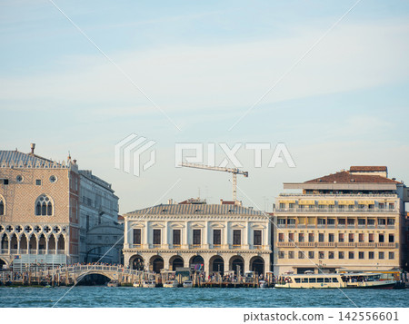 Landscape with Rialto Bridge and gondola Grand Canal in Venice, Italy, Europe. Landscape with Rialto Bridge and gondola Grand Canal in Venice, Italy, Europe. 142556601