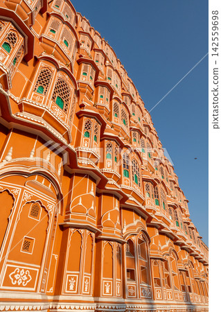 A view of the windows of the Palace of Winds from an angle. A view of the windows of the Palace of Winds from an angle. 142559698