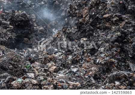 Smoke occurs from deep-seated fires under the landfill. Smoke occurs from deep-seated fires under the landfill. 142559863