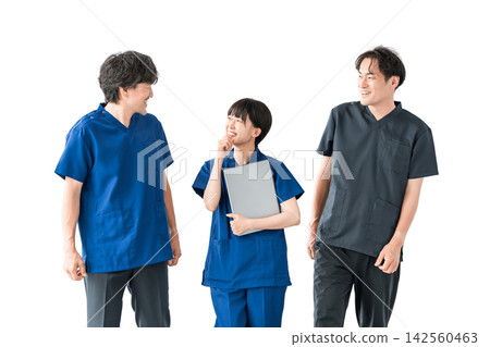 A doctor and three medical staff members communicating with smiles. A cutout image of people representing teamwork and collaboration in healthcare. A doctor and three medical staff members communicating with smiles. A cutout image of people representing teamwork and collaboration in healthcare. 142560463