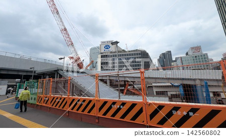 Shinjuku Station redevelopment construction site and crane Shinjuku Station redevelopment construction site and crane 142560802