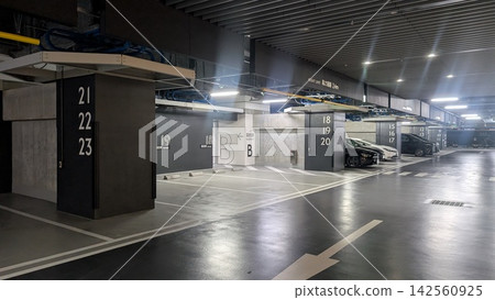 Multi-story parking garages and vacant spaces in the city center Multi-story parking garages and vacant spaces in the city center 142560925