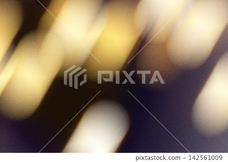 Abstract motion blur background creating warm golden light streaks and atmospheric glow Abstract motion blur background creating warm golden light streaks and atmospheric glow 142561009