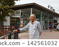 Senior man taking a break at a service area Senior man taking a break at a service area 142561032