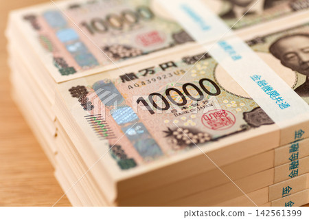 A stack of banknotes worth 10 million yen A stack of banknotes worth 10 million yen 142561399