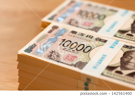 A stack of banknotes worth 10 million yen A stack of banknotes worth 10 million yen 142561400