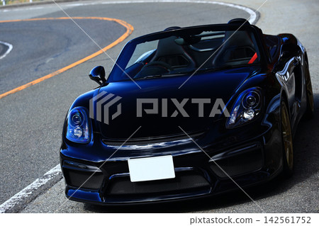 shiny black open car shiny black open car 142561752