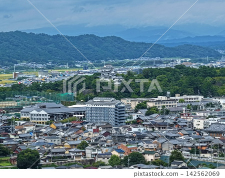 Aerial photograph capturing the cityscape and castle architecture of Iga City, Mie Prefecture. Aerial photograph capturing the cityscape and castle architecture of Iga City, Mie Prefecture. 142562069