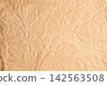 Brown crumpled paper texture with organic texture 142563508