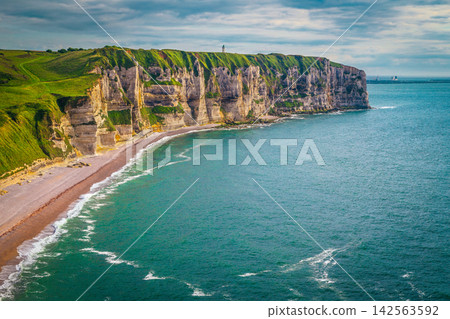 Stunning beach and high cliffs near Etretat, Normandy, France Stunning beach and high cliffs near Etretat, Normandy, France 142563592