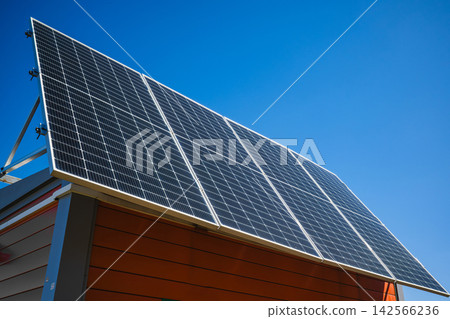 Rooftop Solar Panel Installation Close-up Rooftop Solar Panel Installation Close-up 142566236