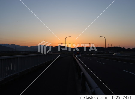 A feeling of loneliness made me instinctively take a picture of a bridge at sunset. A feeling of loneliness made me instinctively take a picture of a bridge at sunset. 142567451