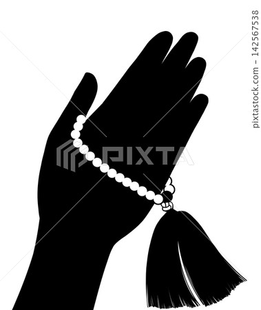 一隻女人的手拿著念珠的剪影 一隻女人的手拿著念珠的剪影 142567538